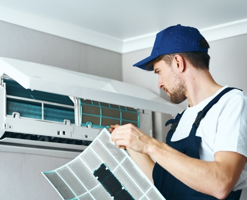 image of a man doing maintenance